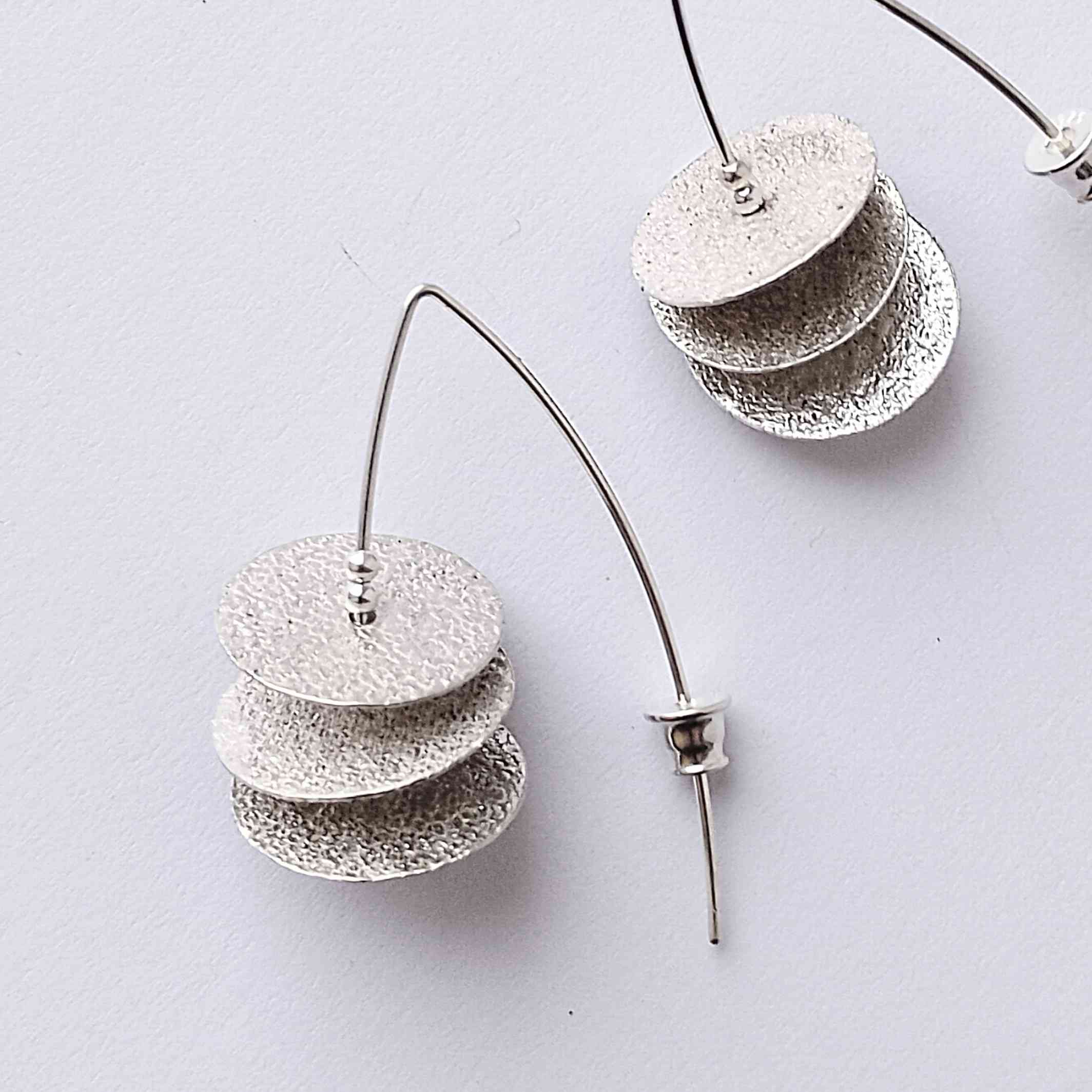 Three Movable & Loosely Resting Discs Drop Earrings on Arch Pins