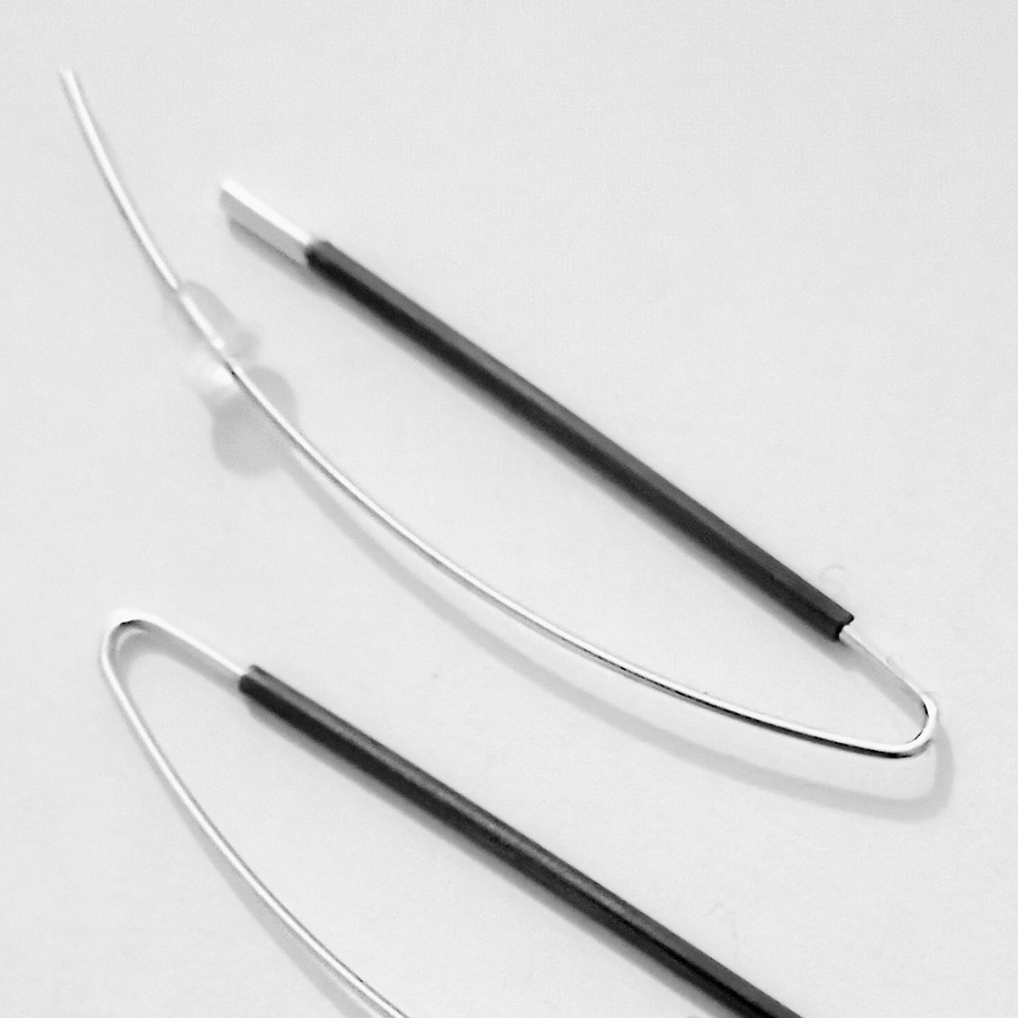 Long Minimalist Oxidised Tubes Drop Earrings on a Feature Ear Pin